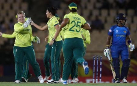 South Africa celebrate the fall of a Sri Lankan wicket during their opener on Monday at the Darren Sammy Cricket Stadium. (Photo by ICC Media) 