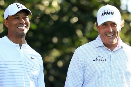 Phil Mickelson (right) and Tiger Woods
