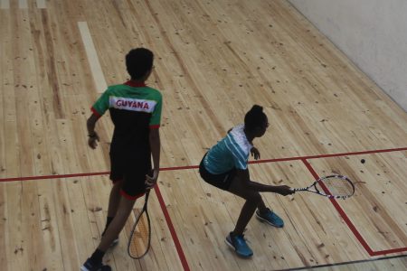 Abosaide Cadogan gears up to play a drop shot during her opening match win over Lucas Jonas last evening