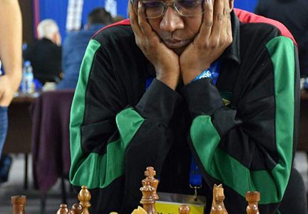 Loris Nathoo in deep concentration at the 2018 Chess Olympiad in Batumi, Georgia. Nathoo played Board Three for Guyana against the finest third boards worldwide. One hundred and eight-three countries contested the Olympiad with China taking gold in the men’s and women’s categories. 
