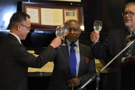 Minister of Foreign Affairs Carl Greenidge (left) , Honorary Consul Ramesh Dookhoo (right) and South Korea’s Chargé d’ Affaires Dong-il Oh toast the opening of the South Korean Consulate. (DPI photo)