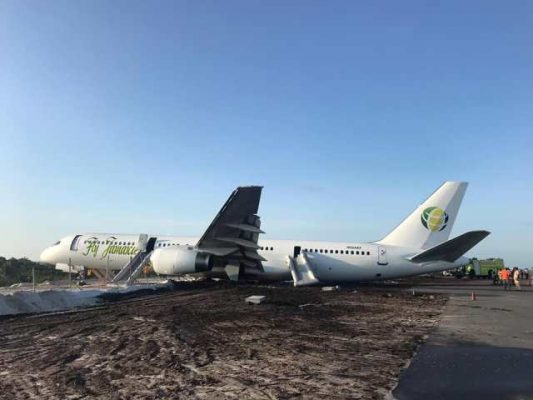 The Fly Jamaica Flight OJ 256 rests at the spot where it came to a standstill after making an emergency landing  (DPI photo)