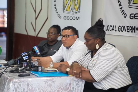 Returning Officer of Georgetown, Duarte Hetsberger (second from right) delivers the results in the presence of GECOM’s PRO Yolanda Ward [right] and the RO’s clerk, Michelle Miller. (DPI photo)