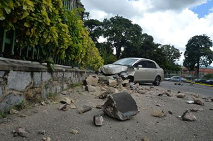 A damaged vehicle in the Trinity Cathedral carpark on Thursday following Tuesday’s 6.9 magnitude earthquake which caused a section of the building’s facade to fall off.