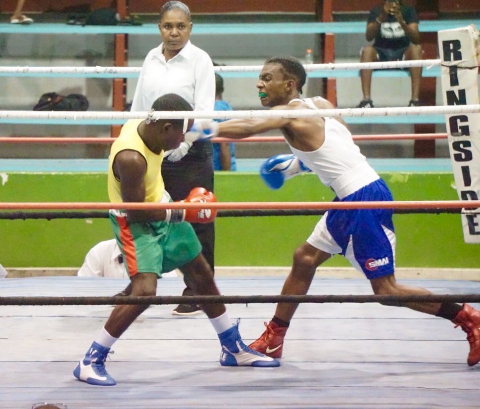 Seon Griffith (right) of the Forgotten Youth Foundation (FYF) Gym used his superior reach and jabbed his way to a points win against Julius Kesney of the GDF. 