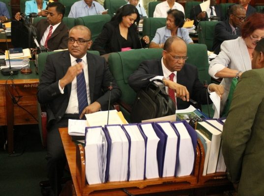 Opposition Leader Bharrat Jagdeo (left) during a sitting of Parliament.