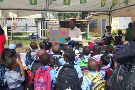 Pupils paying keen attention to what was being taught by a teacher at a Numeracy and Literacy fair held at the Rose Hall Town Primary School last Monday.  The objective of the fair was to build, display and demonstrate materials that can be used to promote literacy and numeracy in classrooms.