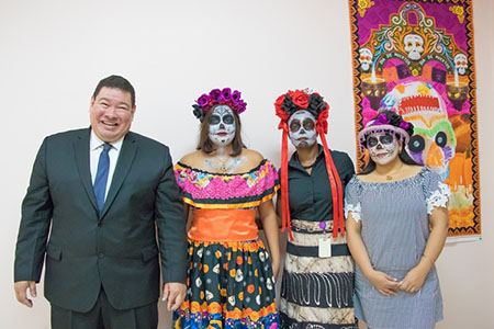 Mexican Ambassador to Guyana, Ivan Roberto Sierra-Medel (left) and staff dressed for the occasion (DPI photo)