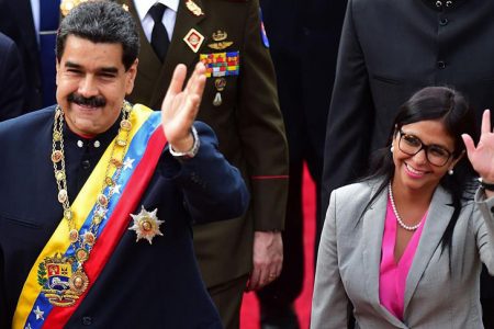 Nicolás Maduro (left) and Delcy Rodríguez
