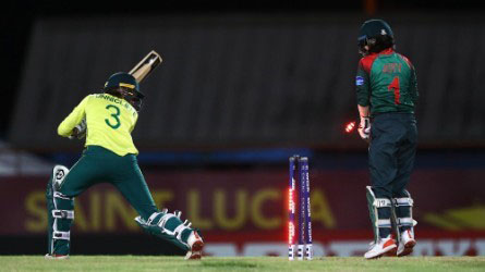 South  Africa’s Faye Tunnicliffe looks back to see her stumps rattled during the final preliminary match of the ICC Women’s T20 World Cup against Bangladesh on Sunday. (Photo courtesy ICC Media)