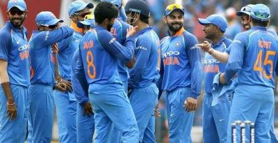 Indian players celebrating the fall of another West Indies wicket 