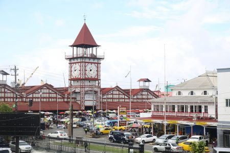 The majestic Stabroek Market and its hubbub as seen from the Public Buildings on Friday. (Terrence Thompson photo)