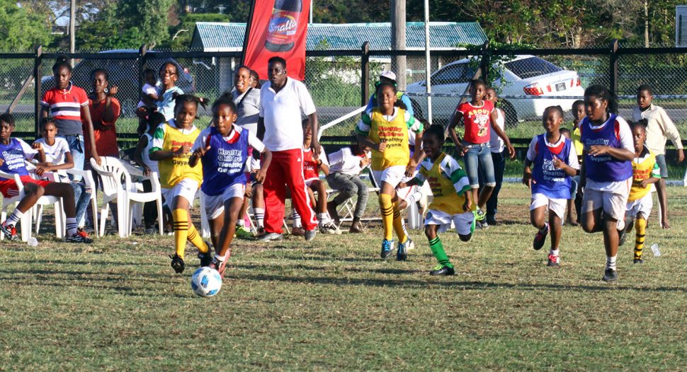 Scenes from the Smith Memorial and St. Pius clash in the Smalta Girls Pee Wee Football Championship at the Ministry of Education ground, Carifesta Avenue.