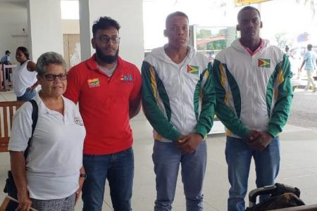 Team Guyana as they departed for Peru on Monday: From left to right Joanne Lowe (official), Haresh Bhagwan (national coach), Fitzroy Thom and Andrew Jordan 
