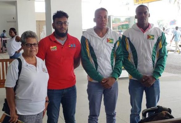 Team Guyana as they departed for Peru on Monday: From left to right Joanne Lowe (official), Haresh Bhagwan (national coach), Fitzroy Thom and Andrew Jordan 
