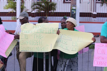 Supporters of the government outside of Parliament during yesterday’s 2019 budget presentation. (Terrence Thompson photo) 