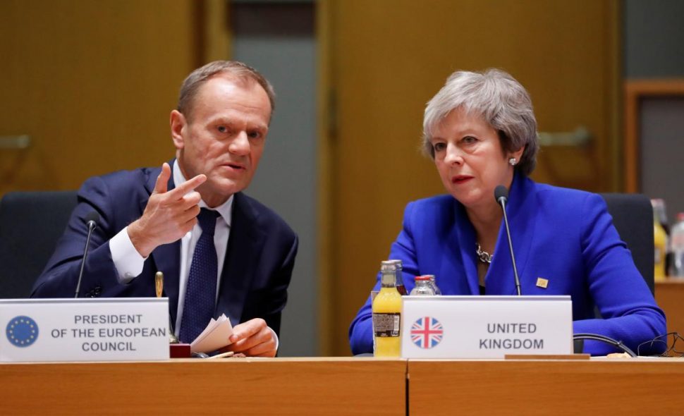 British Prime Minister Theresa May (R) and European Union Council President Donald Tusk during the extraordinary EU leaders summit to finalise and formalise the Brexit agreement in Brussels, Belgium November 25, 2018. Olivier Hoslet/Pool via REUTERS