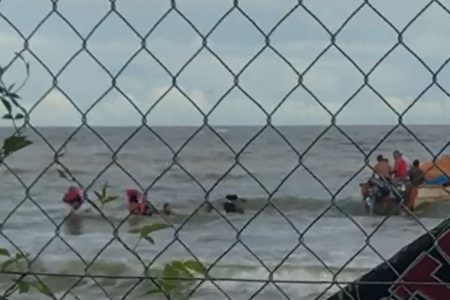 A screenshot from the video showing the illegal aliens coming ashore in Trinidad.