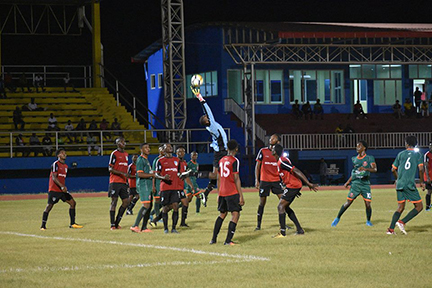 Goalkeeper Sese Norville of Milerock rising above all challengers to catch the ball during his side’s clash with Fruta Conquerors in the GFF’s Stag Beer Super 16 Championship at the National Track and Field Centre, Leonora.