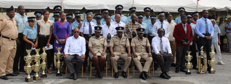 Awardees pose with senior members of the Guyana Police Force following yesterday’s ceremony. Seated from left to right are Crime Chief Lyndon Alves, Deputy Commissioner Maxine Graham, Commissioner of Police Leslie James, Deputy Commissioner Paul Williams and Deputy Commissioner Nigel Hoppie.