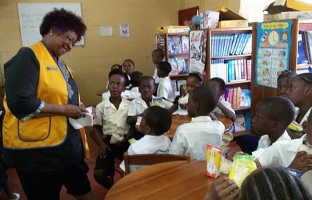 Jocelyne Josiah interacts with children during a programme 