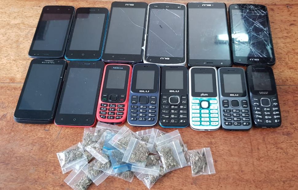 The cell phones and cannabis that were among the contraband items found yesterday at the New Amsterdam Prison.
