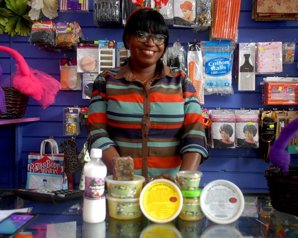 Marcelle Allen displays an assortment of her hair and body treatments
