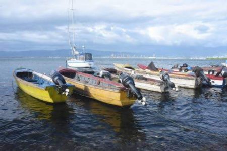 Boats line the harbour in Port Royal from which Herbert Dowie and 12 passengers left for Maiden Cay. 