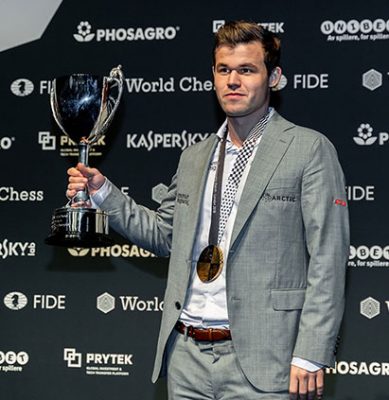 2018 World Chess Champion, Norway’s Magnus Carlsen with his gold medal and trophy during the closing ceremony of the World Championship Match on Wednesday last, in London, England. Carlsen defeated the USA’s Fabiano Caruana, thus retaining his title. The 12 classical games were all drawn and the match went into overtime during which Carlsen prevailed with three victories. (Photo: Niki Riga) 