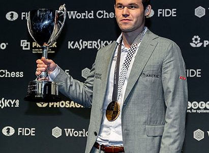 2018 World Chess Champion, Norway’s Magnus Carlsen with his gold medal and trophy during the closing ceremony of the World Championship Match on Wednesday last, in London, England. Carlsen defeated the USA’s Fabiano Caruana, thus retaining his title. The 12 classical games were all drawn and the match went into overtime during which Carlsen prevailed with three victories. (Photo: Niki Riga) 