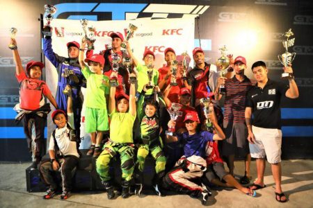 Prize winners of the second KFC Mega Cup Grand Prix pose for a photo following the event on Sunday at GT Motorsports.