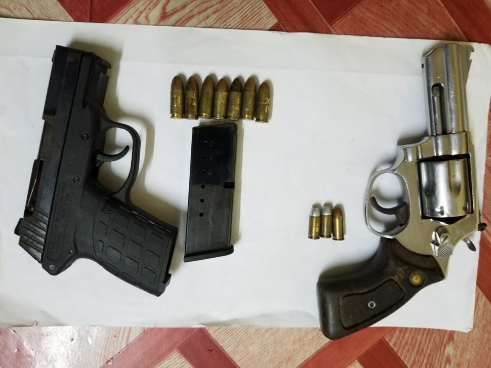 The illegal guns that were found at the suspect’s home.
