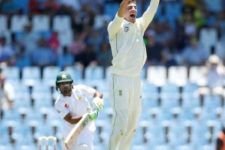 South Africa fast bowler Duanne Olivier celebrates the wicket of Asad Shafiq. (Reuters photo)
