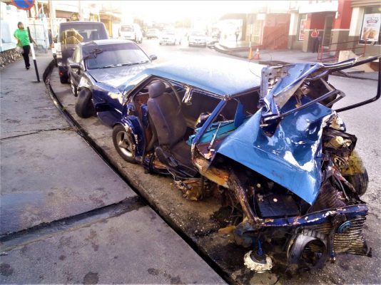 Two children were in this crashed car. They survived.