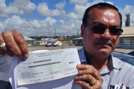 An Ex-Petrotrin employee Shankar Teelucksingh shows the proof that he filed his 2017 income tax return. 