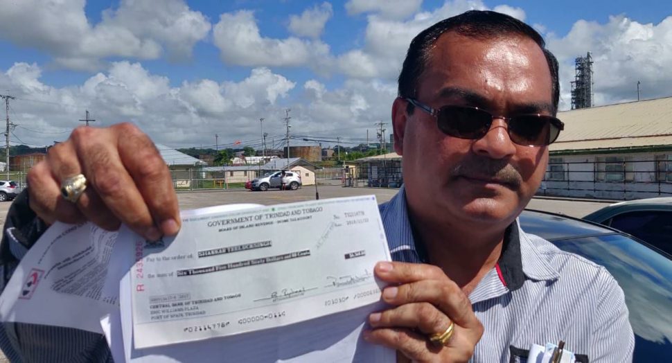 An Ex-Petrotrin employee Shankar Teelucksingh shows the proof that he filed his 2017 income tax return. 