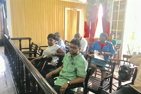 Observing proceedings: Incoming Mayor of Georgetown, Ubraj Narine (front right) yesterday sat in the city council’s gallery and observed the proceedings of the council’s statutory meeting. Narine is the Mayor-elect following the November 12 Local Government Elections. He will take up the role as First Citizen from January 2019.