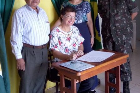  The official signing of the document handing over the 8 wells in the South Rupununi, dug by the Brazilian army in conjunction with the Guyana Defence Force, to the Guyanese Government was done on Tuesday during a ceremony at the Brazilian Consulate in Lethem.The document was signed by the Regional Chairman Bryan Allicock, Lt Col Vandir Pereira Soares Junior (not pictured); witnessing the signing were Brazilian Vice-Counsel to Guyana Lisa Reis and President of Rupununi Chamber of Commerce and Industry Allison Camacho.