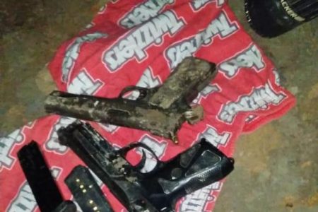 The two handguns and magazines with matching ammunition that were found after the attack 