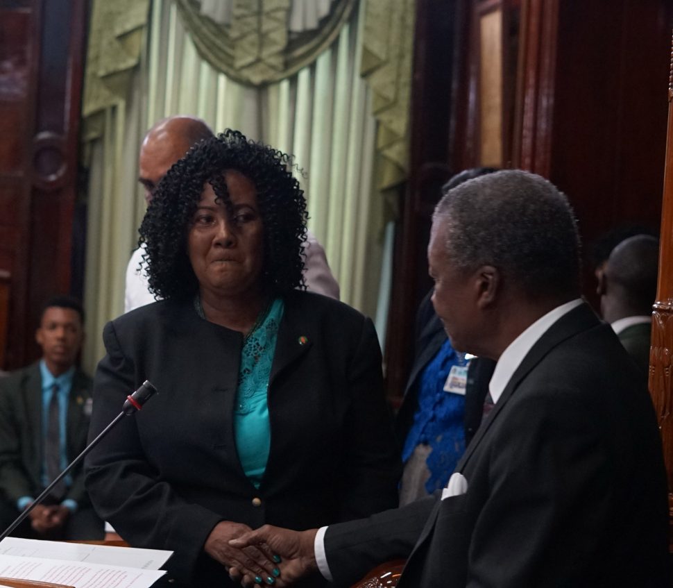 Guyana’s newest Member of Parliament Barbara Pilgrim (left) shakes the hand of Speaker Dr Barton Scotland after taking the oath of office.  (Terrence Thompson photo)
