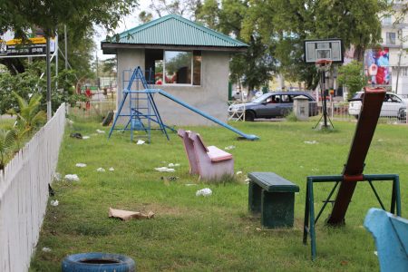 The playground on Merriman Mall littered with garbage. The city has faced growing questions about garbage collection.  (Terrence Thompson photo)