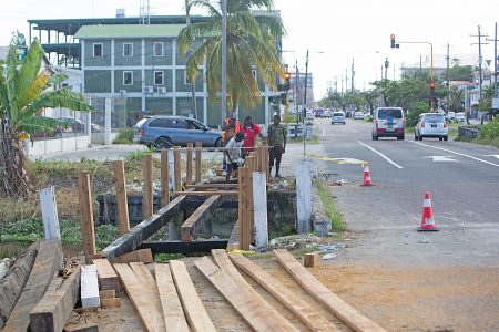  This bridge leading from Camp Road to Lamaha Street was being redone yesterday in time for the reopening of schools tomorrow.  The bridge separates pedestrians from the heavy traffic at the junction. (Terrence Thompson photo)
