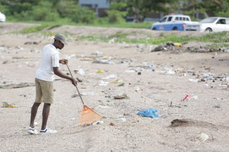 This young man and a friend spent Saturday cleaning along the Georgetown seawall. The young men who told Stabroek News they were not affiliated with any organization explained that they clean the area every weekend. 