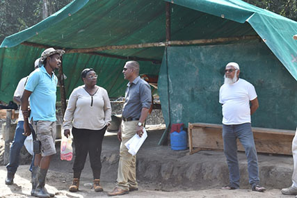 Minister within the Ministry of Natural Resources Simona Broomes speaks with acting GGMC Manager of Mines Krishna Ramdass during the site visit. (DPI photo)