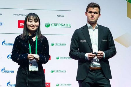 Chinese chess grandmaster Ju Wenjun (left) the new 2018 Rapid World Champion, with 2018 Classical and Blitz World Champion Magnus Carlsen recently in St Petersburg, Russia (Photo: Lennart Ootes)