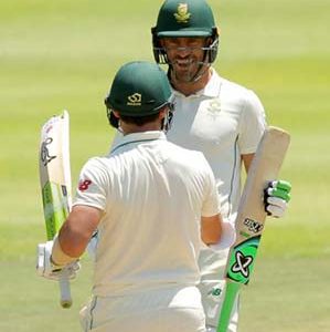 South Africa’s Dean Elgar and Faf du Plessis celebrate after they won the second test. (Reuters photo)