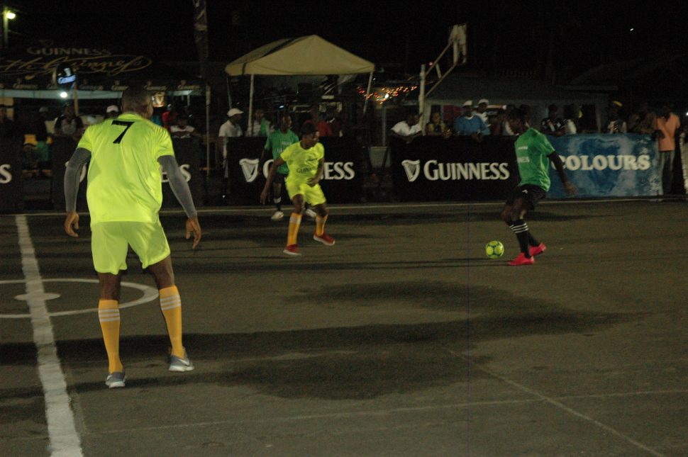 Flashback-Scenes from the opening game of the Guinness ‘Greatest of the Streets’ West Demerara/East Bank Demerara leg between Up-Top-Bosses and Boom Bang [dark green] at the Pouderoyen Tarmac
