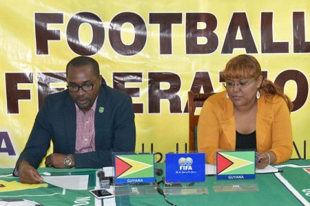 President Wayne Forde reads a statement into the investigation of sexual assault by Match Referees. Seated next to Forde is Debra Francis, GFF’s Communications Officer. 