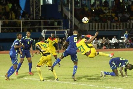 Scenes from the opening CONCACAF Nations League clash between Guyana and Barbados [blue] at the National Track and Field Centre, Leonora which initially ended 2-2. However, Guyana was awarded the match after it was deemed that the Barbadians fielded ineligible players.
