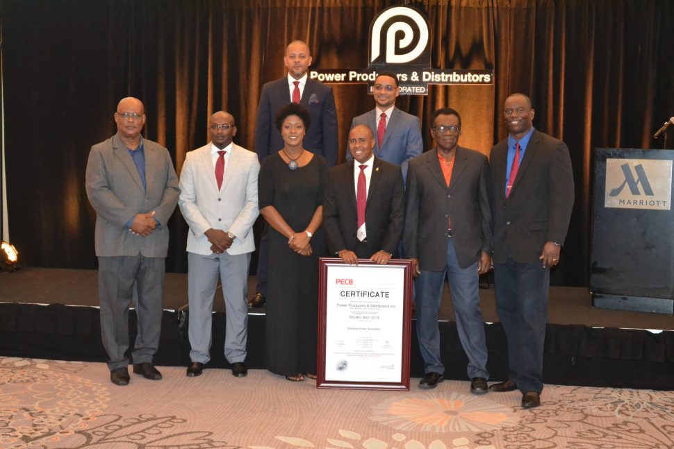 Management and staff of PPDI. Aaron Fraser is third from right in front row. (DPI photo) 